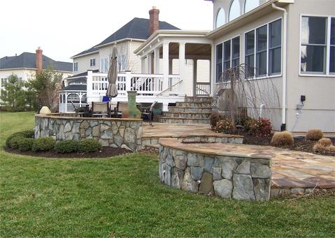 Covered deck and flagstone patio