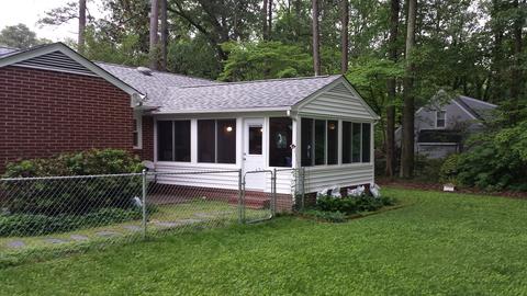 Cathedral sunroom with solid roof