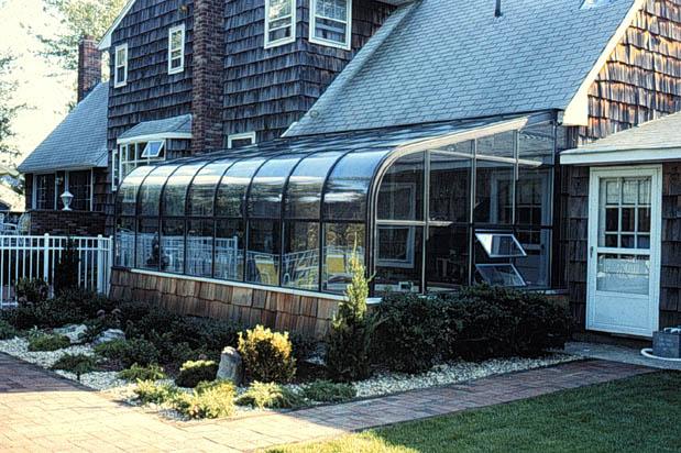 Curved eave sunroom